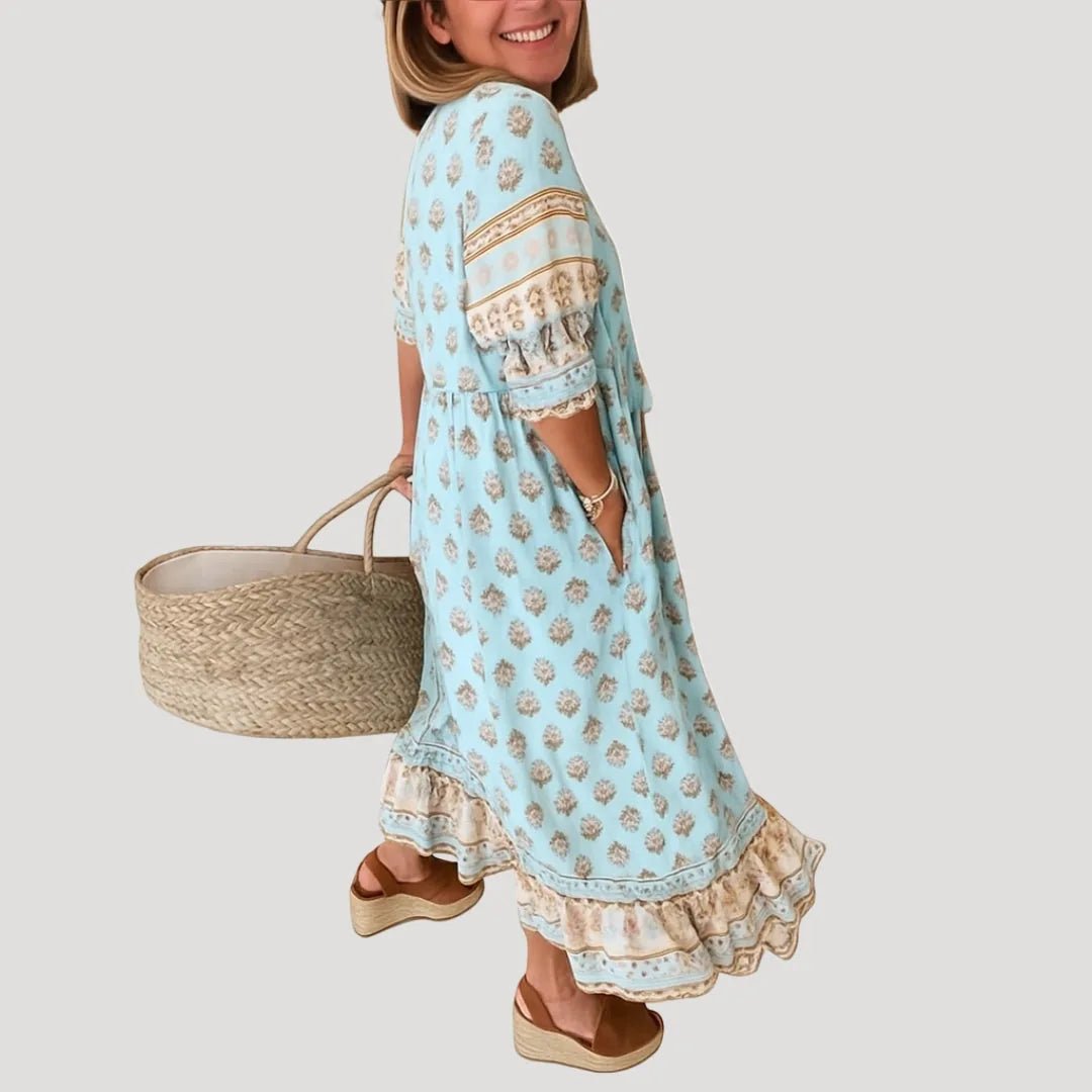 Talia | Stylish Blue V - Neck Tiered Midi Dress with Tassel Details - Emma's Dresses