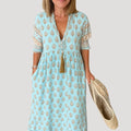 Talia | Stylish Blue V-Neck Tiered Midi Dress with Tassel Details