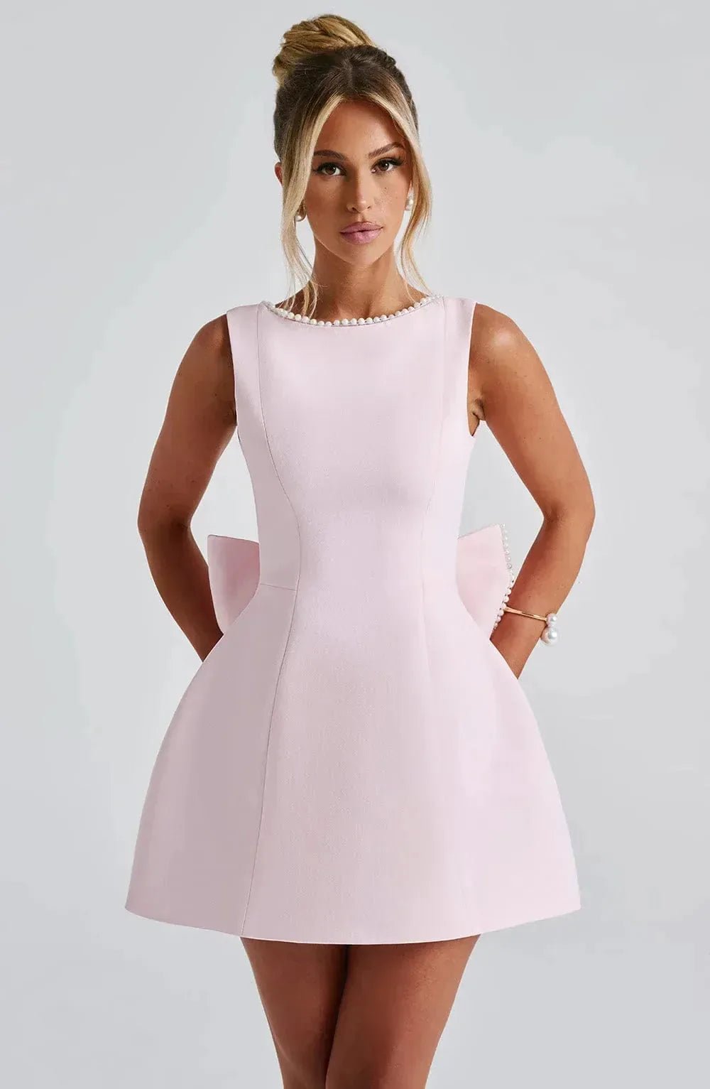 Nadia | Elegant Pearl Trim White Dress with Bow Back Detail - Emma's Dresses