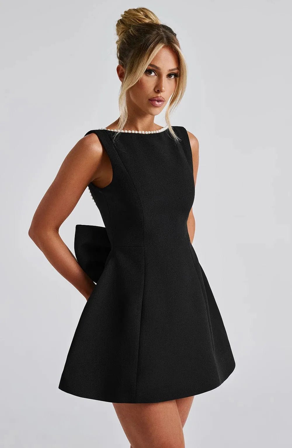 Ivy | Pearl Trim Backless Bow - Back Black Mini Dress - Emma's Dresses