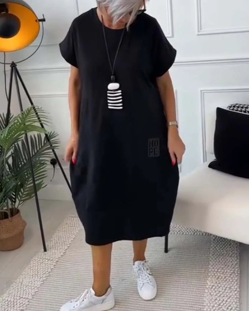Elena | Effortless Short Sleeve Black Midi Dress With Pockets - Emma's Dresses