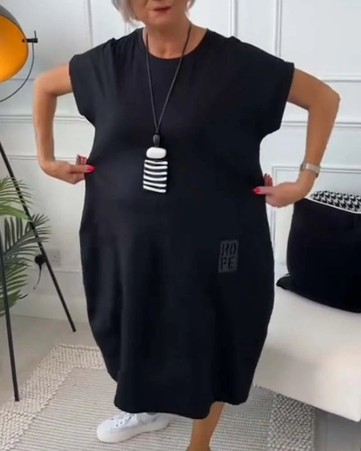 Elena | Effortless Short Sleeve Black Midi Dress With Pockets - Emma's Dresses