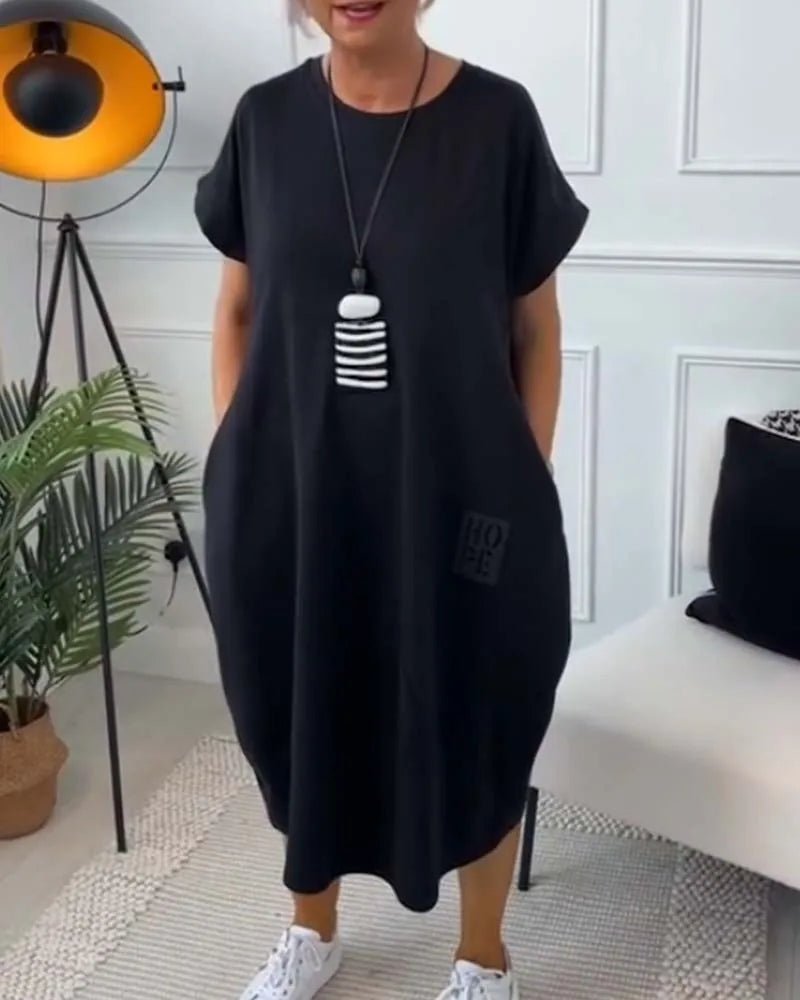 Elena | Effortless Short Sleeve Black Midi Dress With Pockets - Emma's Dresses