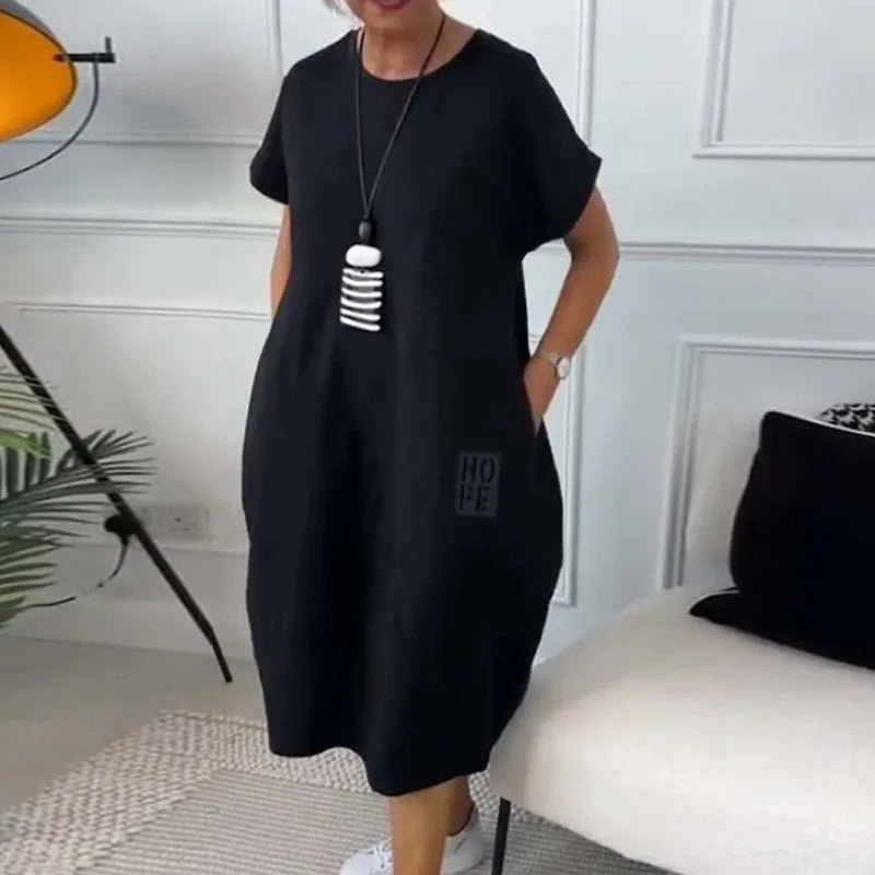 Elena | Effortless Short Sleeve Black Midi Dress With Pockets - Emma's Dresses