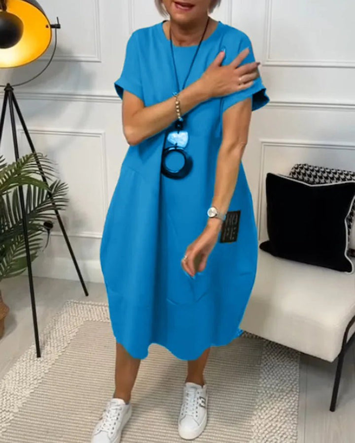 Elena | Effortless Short Sleeve Black Midi Dress With Pockets - Emma's Dresses