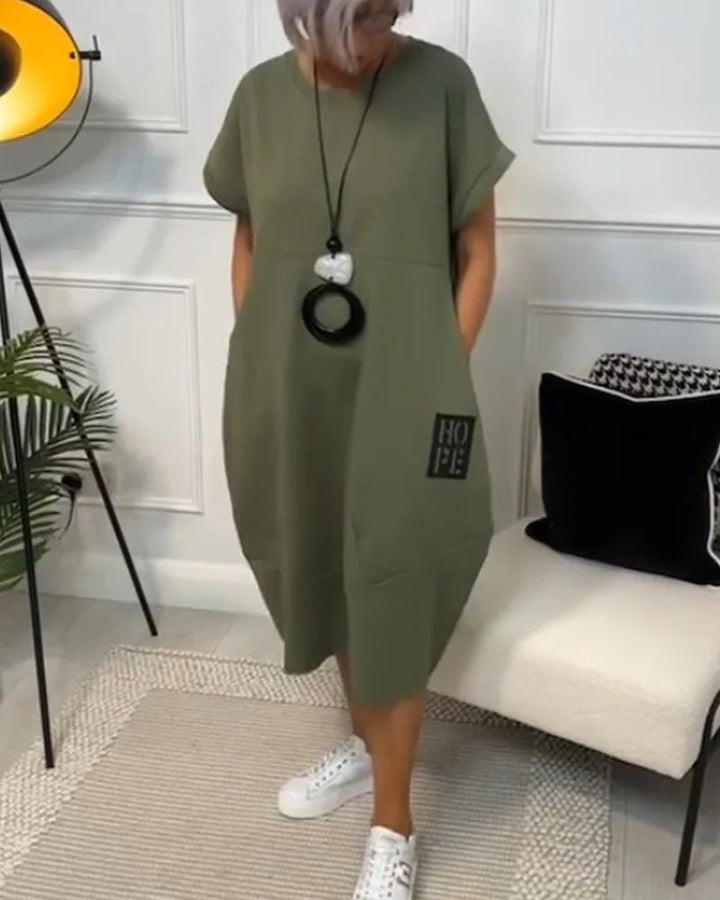Elena | Effortless Short Sleeve Black Midi Dress With Pockets - Emma's Dresses