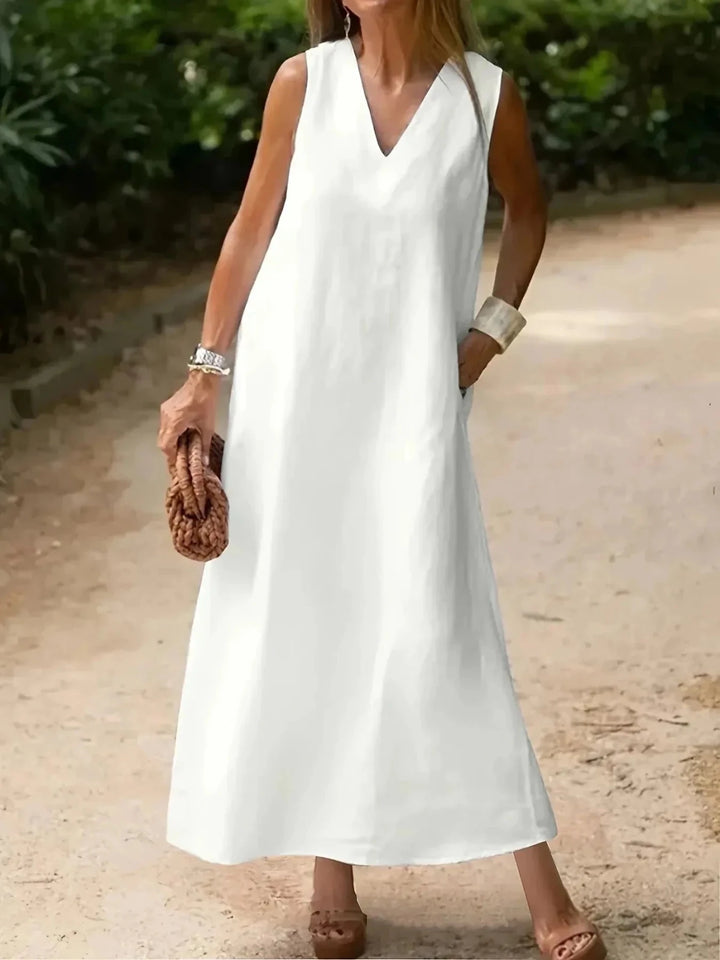 Imogen | Elegant White V - Neck Sleeveless Midi Dress - Emma's Dresses